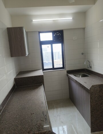 Kitchen in 1.5 BHK Apartment at Chandiwala Pearl Heaven, Andheri East – for Rent