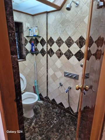 Bathroom in 5 BHK Apartment at Diamond Swati Apartments, Andheri West – for Rent
