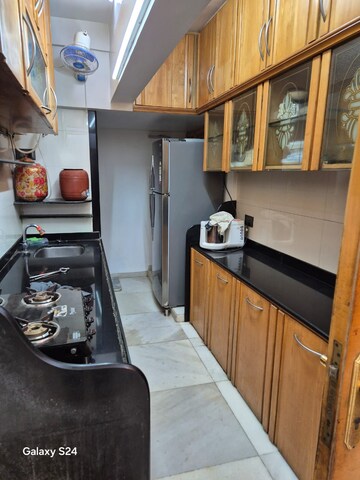 Kitchen in 5 BHK Apartment at Diamond Swati Apartments, Andheri West – for Rent