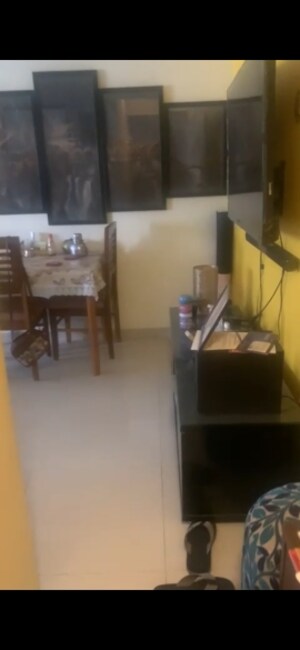 Living Room in 2 BHK Apartment at Swapna Kiran CHS, Malad East – for Sale