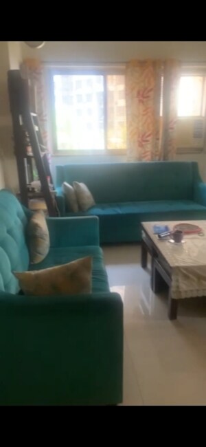 Living Room in 2 BHK Apartment at Swapna Kiran CHS, Malad East – for Sale