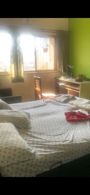 Bedroom in 2 BHK Apartment at Swapna Kiran CHS, Malad East – for Sale