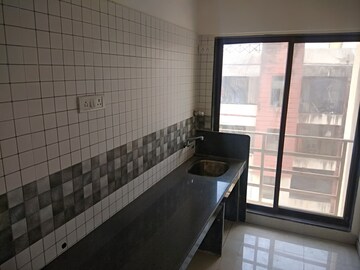 Kitchen in 2 BHK Apartment at Prathamesh Krupa Kedar Darshan, Andheri West – for Rent