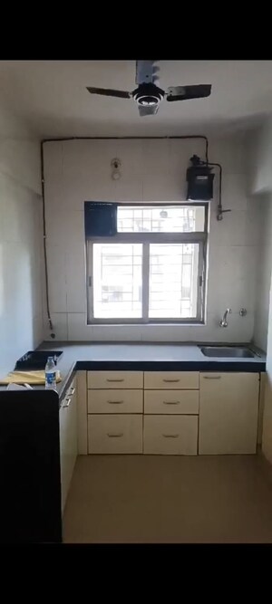 Kitchen in 2 BHK Apartment at Horizon Height, Kasarvadavali – for Sale