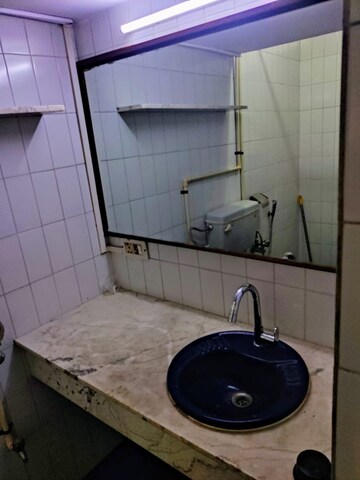 Bathroom in 2 BHK Apartment at Poonam Kirti CHS Ltd, Poonam Nagar – for Rent