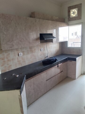 Kitchen in 4 BHK Apartment at Ramprastha Awho, Sector 95 – for Rent