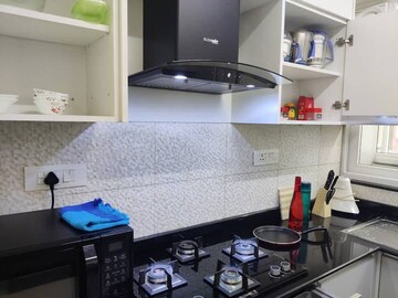 Kitchen in 3 BHK Apartment at Pashmina Waterfront, Old Madras Road – for Rent