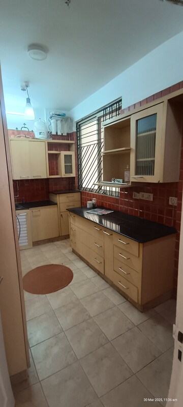 Kitchen in 3 BHK Apartment at Eros Woodbury Tower, Charmwood Village – for Rent