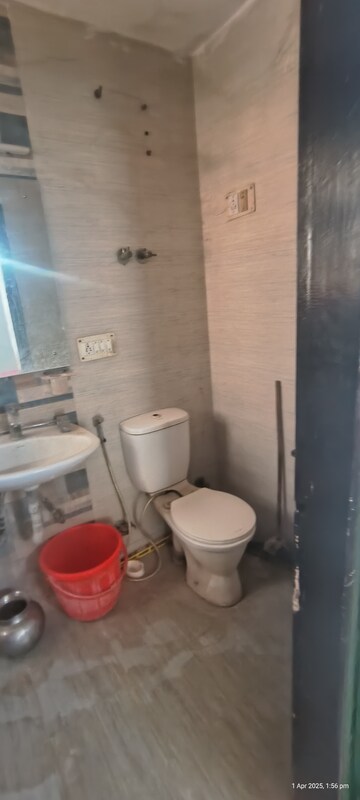 Bathroom in 2 BHK Apartment at Eros Southend Apartments, Charmwood Village – for Rent