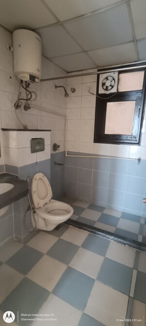 Bathroom in 2 BHK Apartment at Eros Kenwood Tower, Charmwood Village – for Sale