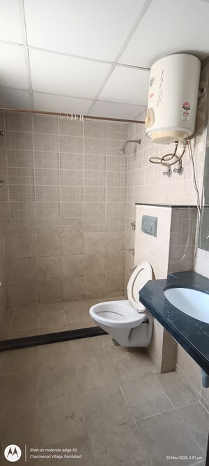 Bathroom in 2 BHK Apartment at Eros Kenwood Tower, Charmwood Village – for Sale