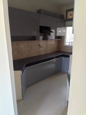 Kitchen in 2.5 BHK Apartment at Ramprastha Awho, Sector 95 – for Sale