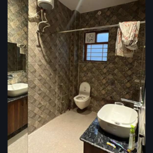 Bathroom in 2 BHK Builder Floor at Sahastradhara Road – for Sale