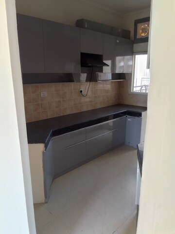 Kitchen in 3 BHK Apartment at Ramprastha Awho, Sector 95 – for Sale