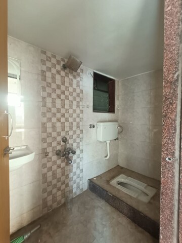 Bathroom in 1 BHK Apartment at Shree Ostwal Orchid Building No 9 to 12, Mira Road – for Sale