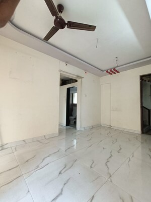 Living Room in 1 BHK Apartment at Ostwal Height, Mira Road – for Sale