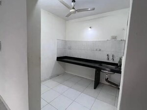 Kitchen in 2 BHK Apartment at Sunshree Woods, Nibm Road – for Sale