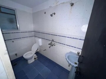 Bathroom in 2 BHK Apartment at Sunshree Woods, Nibm Road – for Sale