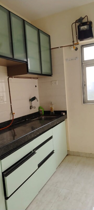 Kitchen in 1 BHK Apartment at Fiama Residency, Ghodbunder Road – for Rent