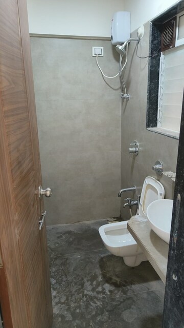 Bathroom in 3 BHK Apartment at Vraj One, Andheri West – for Rent