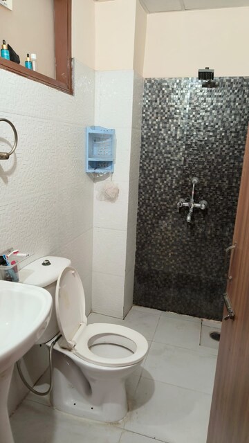 Bathroom in 2 BHK Apartment at Guru Nanak Enclave, Dhakoli Village – for Rent