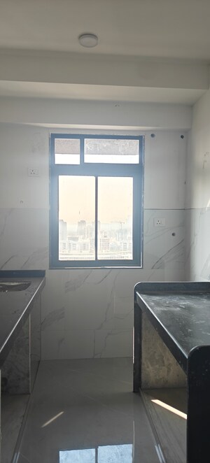 Kitchen in 2 BHK Apartment at Dev Leo Tower, Oshiwara – for Sale