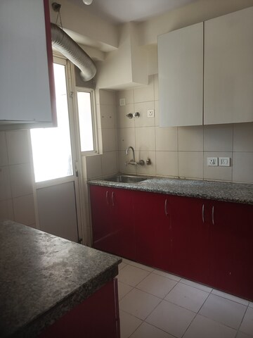 Kitchen in 2.5 BHK Apartment at Lotus Panache, Sector 110 – for Rent