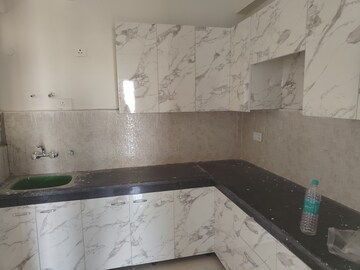 Kitchen in 2 BHK Apartment at Signature The Millennia 2, Sector 37d – for Rent