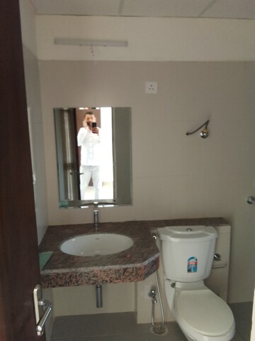 Bathroom in 4 BHK Apartment at Ramprastha Awho, Sector 95 – for Sale
