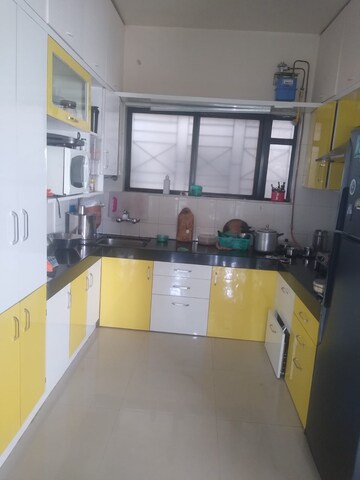 Kitchen in 3 BHK Apartment at Laxmi Krupa Apartments, Bhusari Colony – for Rent