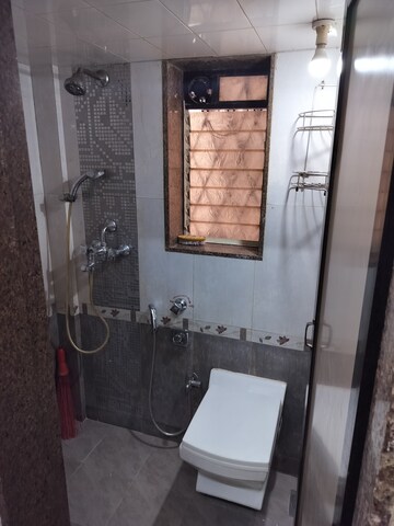 Bathroom in 1 BHK Apartment at Sunrise Apartment Andheri, Andheri West – for Rent