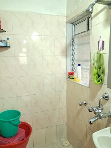 Bathroom in 1 RK Apartment at Gundecha Orchid Tower, Kandivali East – for Rent