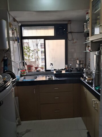 Kitchen in 1 RK Apartment at Gundecha Orchid Tower, Kandivali East – for Rent