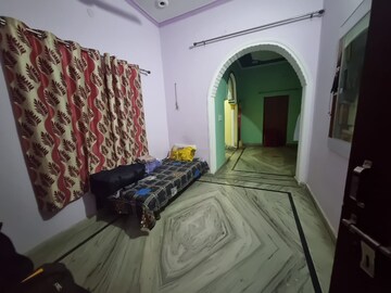 Bedroom in 2 BHK Builder Floor at Aman Luxury Apartments, Sahastradhara Road – for Rent
