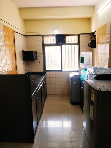 Kitchen in 2 BHK Apartment at Raj Paradise B Wing CHS Ltd, Andheri East – for Rent