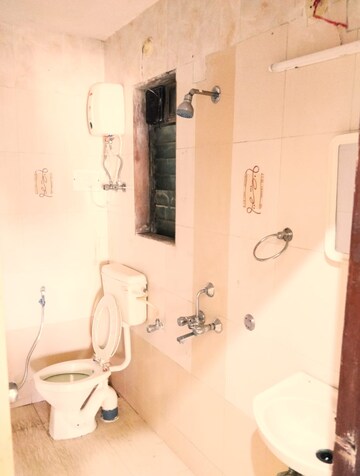 Bathroom in 2 BHK Apartment at Raj Paradise B Wing CHS Ltd, Andheri East – for Rent