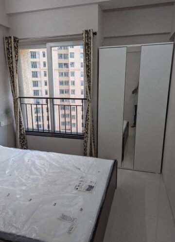Room in 2 BHK Apartment at Rustomjee Azziano Wing D, Majiwada – for Rent