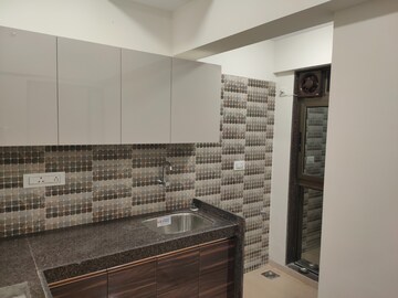 Kitchen in 2 BHK Apartment at Platinum Corporation, Andheri West – for Rent