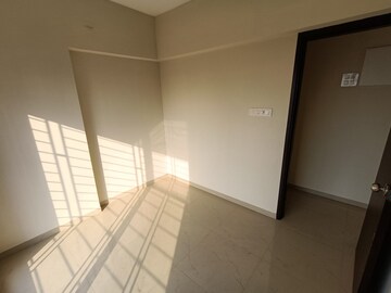 Room in 2 BHK Apartment at Rawalpada – for Sale