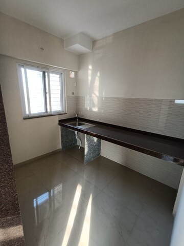 Kitchen in 2 BHK Apartment at Rawalpada – for Sale
