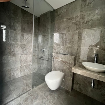 Bathroom in 3 BHK Apartment at Oberoi Realty Esquire, Gokuldham Colony – for Rent