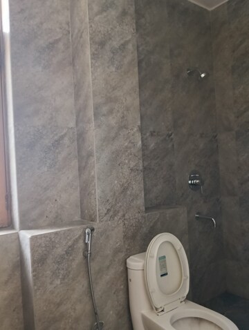 Bathroom in 4 BHK Builder Floor at DLF Star Mall, Sector 30 – for Rent