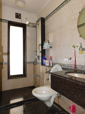 Bathroom in 2 BHK Apartment at Goyal Lakshchandi Heights, Goregaon East – for Rent