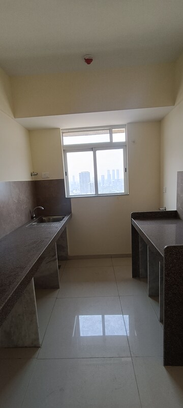 Kitchen in 1 BHK Apartment at Godrej Nest Kandivali, Kandivali East – for Rent