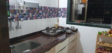 Kitchen in 3 BHK Penthouse at Simran Society, Naupada – for Sale