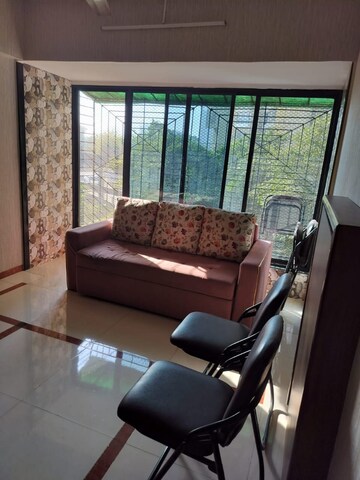 Living Room in 2 BHK Apartment at Aakanksha Garden, Manpada – for Sale