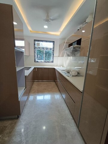 Kitchen in 4 BHK Builder Floor at Ansal API Versalia, Sector 67a – for Sale