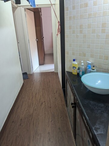 Bathroom in 2 BHK Apartment at Lokhandwala Breeze Apartments, Andheri West – for Rent