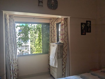 Bedroom in 2 BHK Apartment at Lokhandwala Breeze Apartments, Andheri West – for Rent