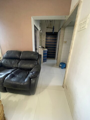 Living Room in 2 BHK Apartment at Kandarpada – for Sale